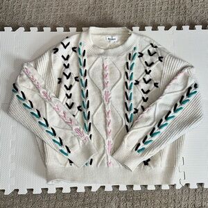 Cream Sweater with Stitch Accents